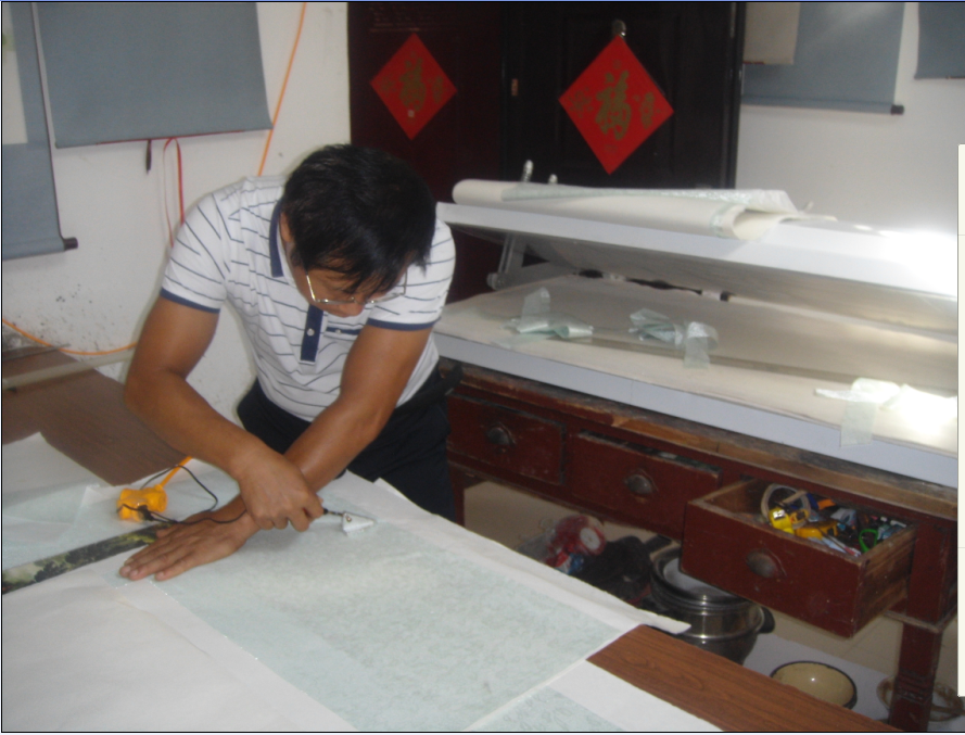 机器装裱与手工装裱的区别